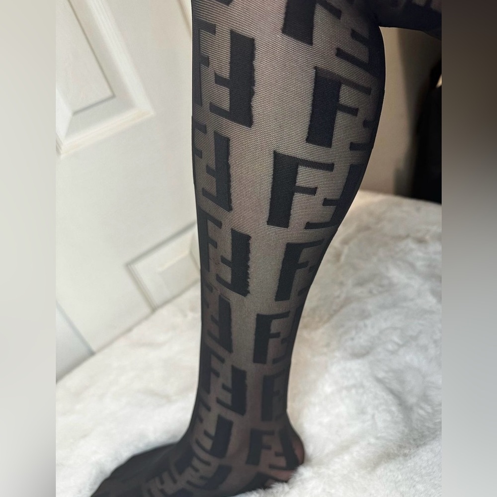 Black Thights, one size brand new.